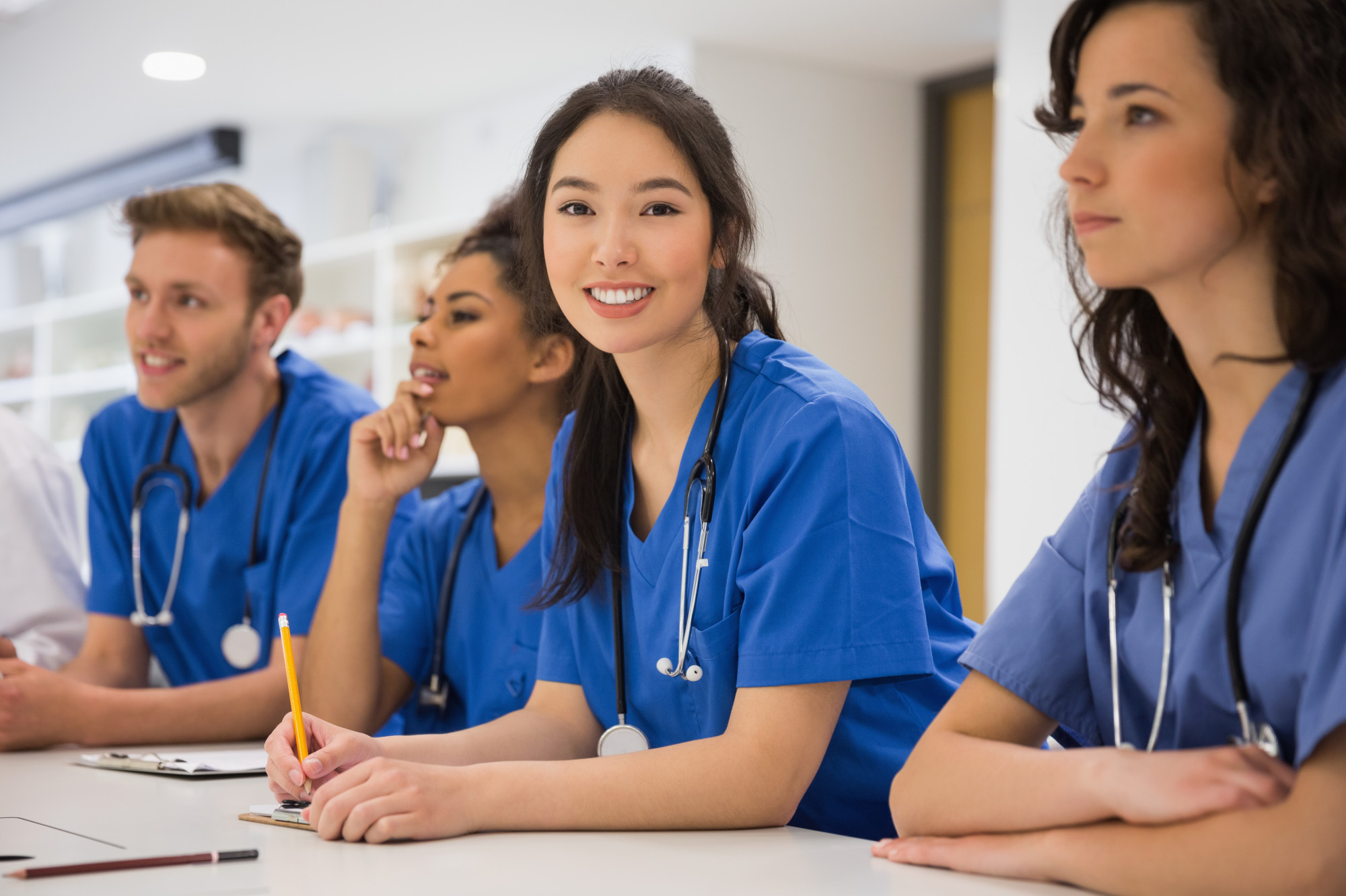 medical-student-smiling-camera-class